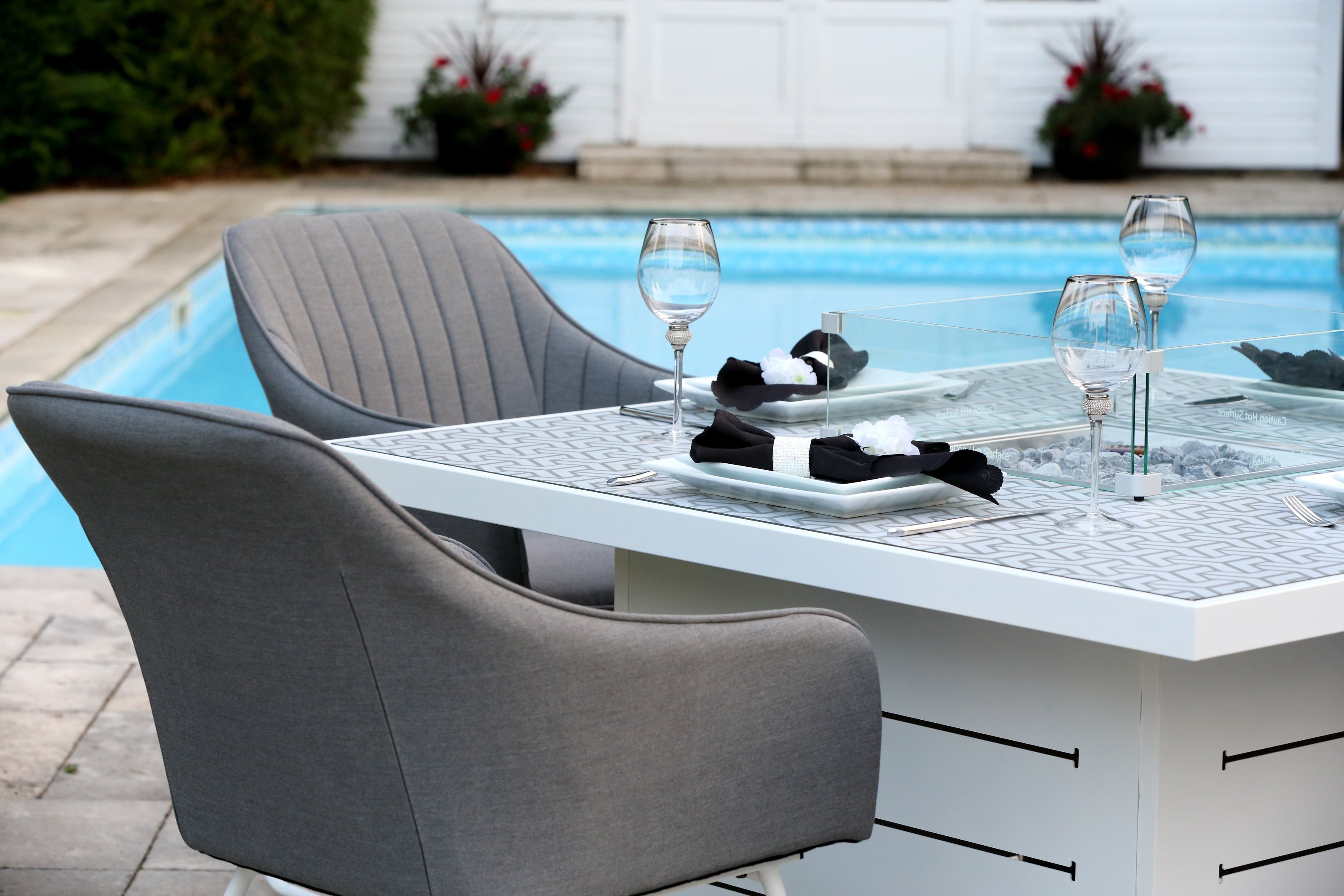 White Fire Pit Garden Dining Table. Grey Garden Dining Chairs