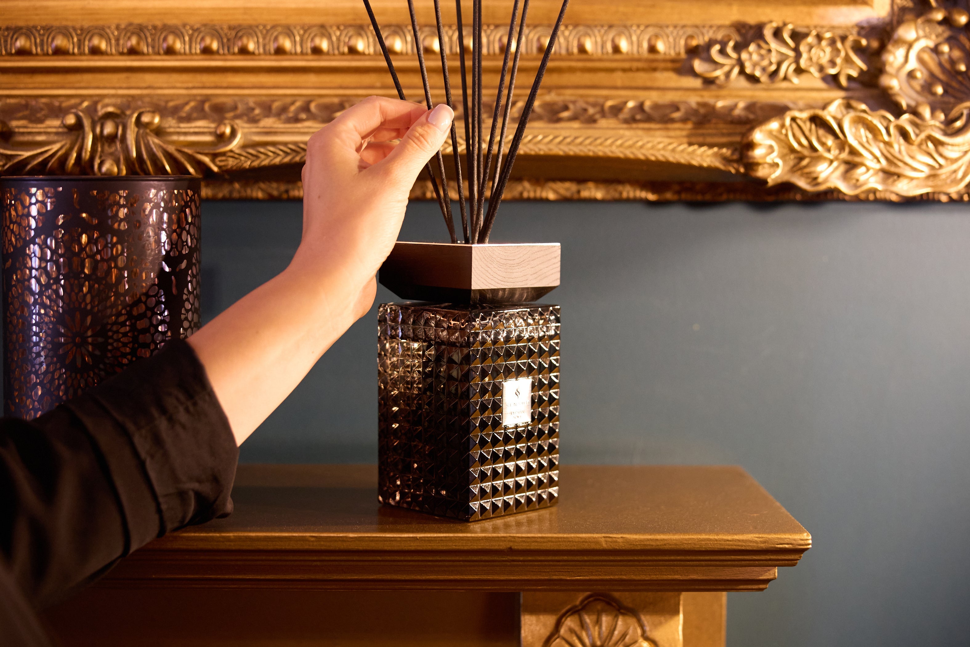 Rearranging the reed sticks on Sensum's Signature Scent 500ml Reed Diffuser